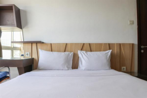 Relaxing 2BR Apartment at Scientia Residence By Travelio
